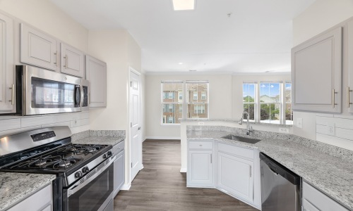 well lit kitchen with ample countertop space