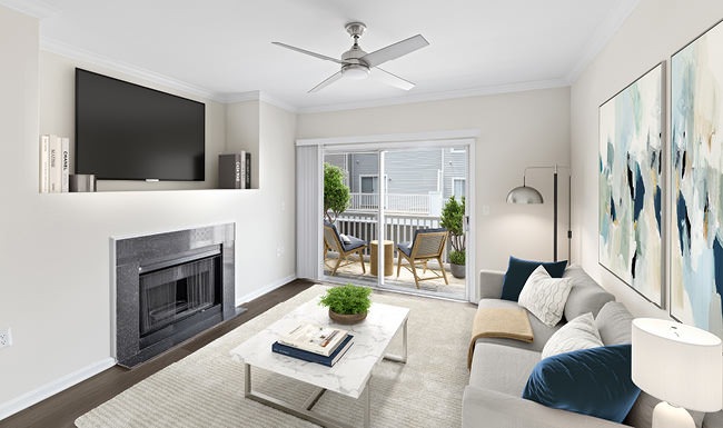 ceiling fan with light fixture in living room with private patio access