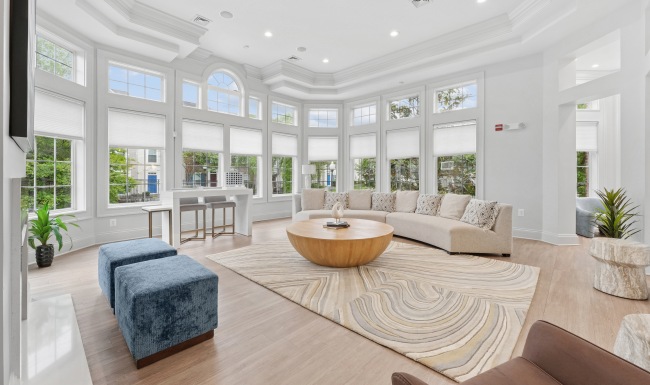 Beautiful clubroom with lounge seating and natural lighting